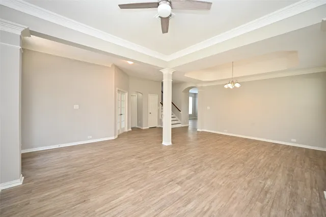a view of a livingroom with wooden floor