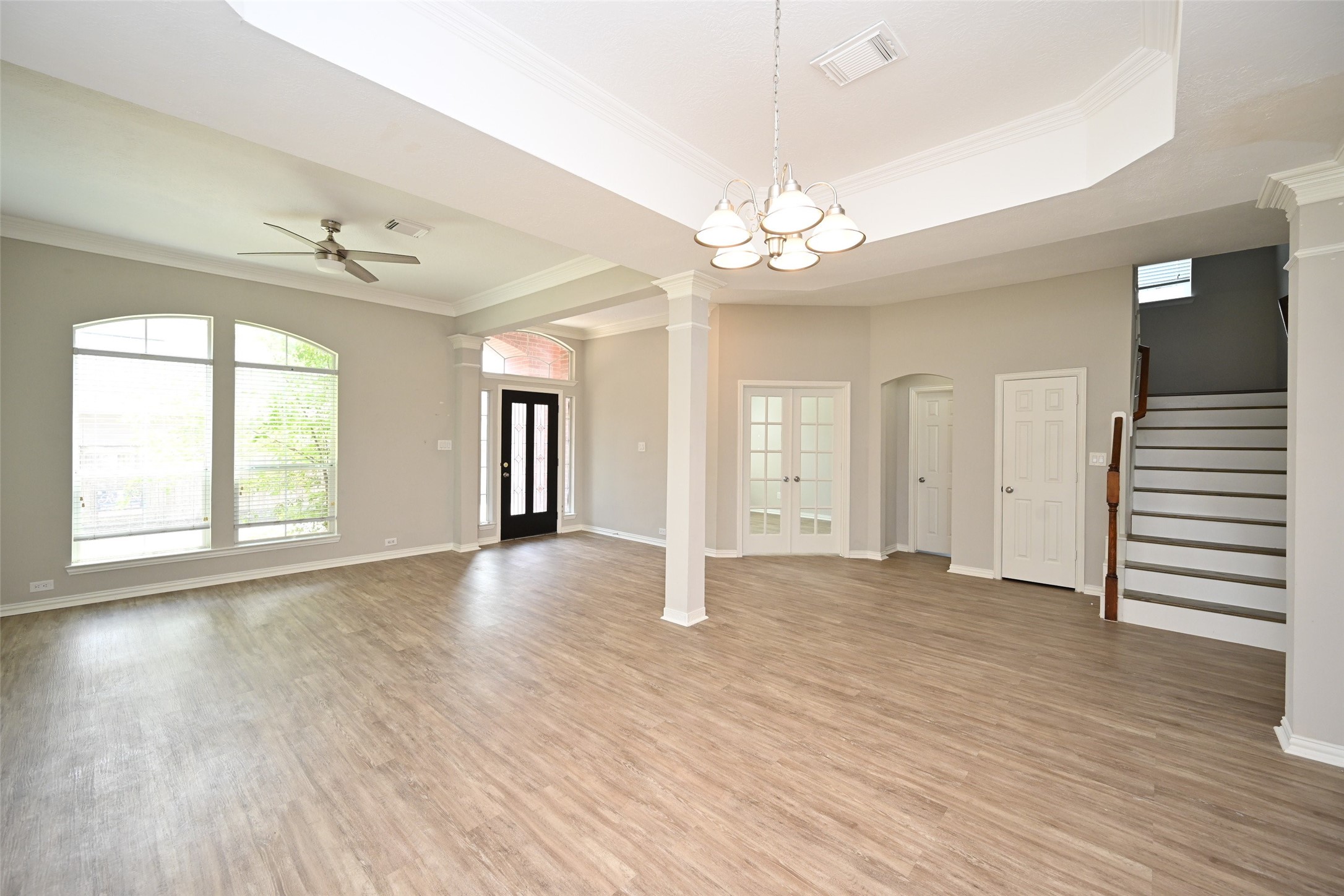 1502 Beaconshire Houston, TX 77077 - Photo 6 of 29 wooden floor in an empty room with a window