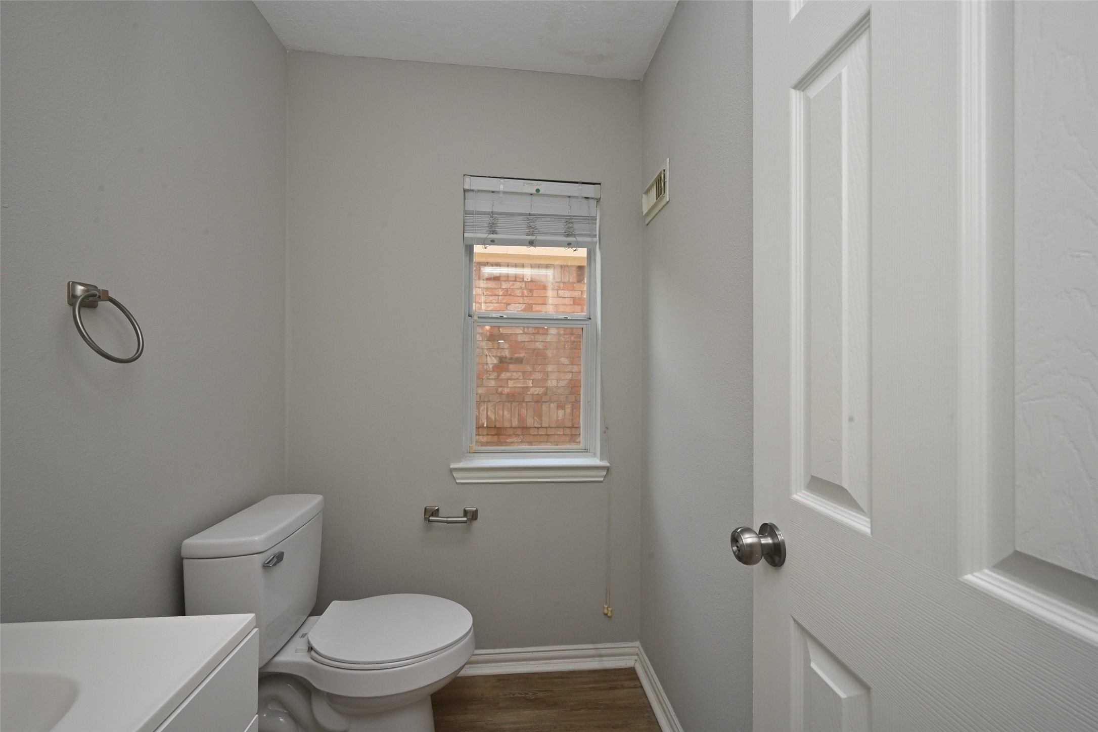 1502 Beaconshire Houston, TX 77077 - Photo 8 of 29 a white toilet sitting next to a bathroom sink