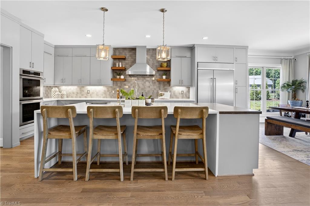 6634 Linville Ridge Drive Oak Ridge, NC 27310 - Photo 15 of 50 Tons of seating available at this island
