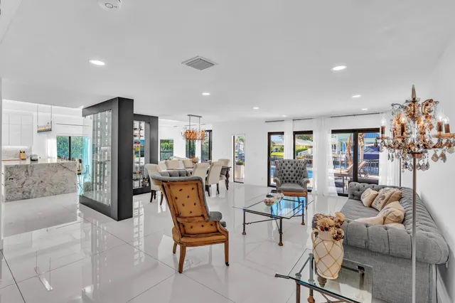 a large kitchen with a table and chairs