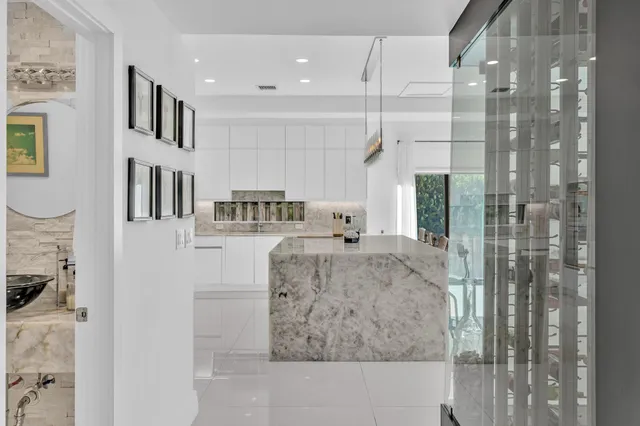 a view of a swimming pool with a lounge chairs