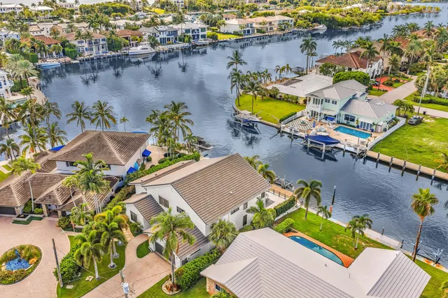 a view of a swimming pool with an ocean view