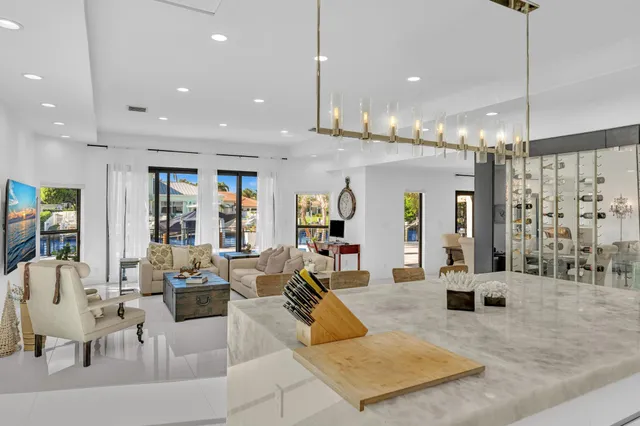 a view of a bedroom with furniture and a window