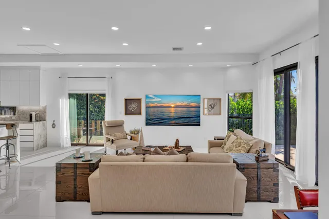 an aerial view of residential building and ocean