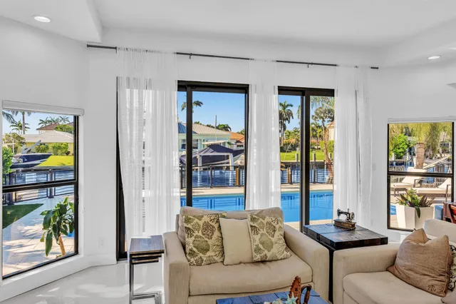 a view of house with outdoor space and seating area