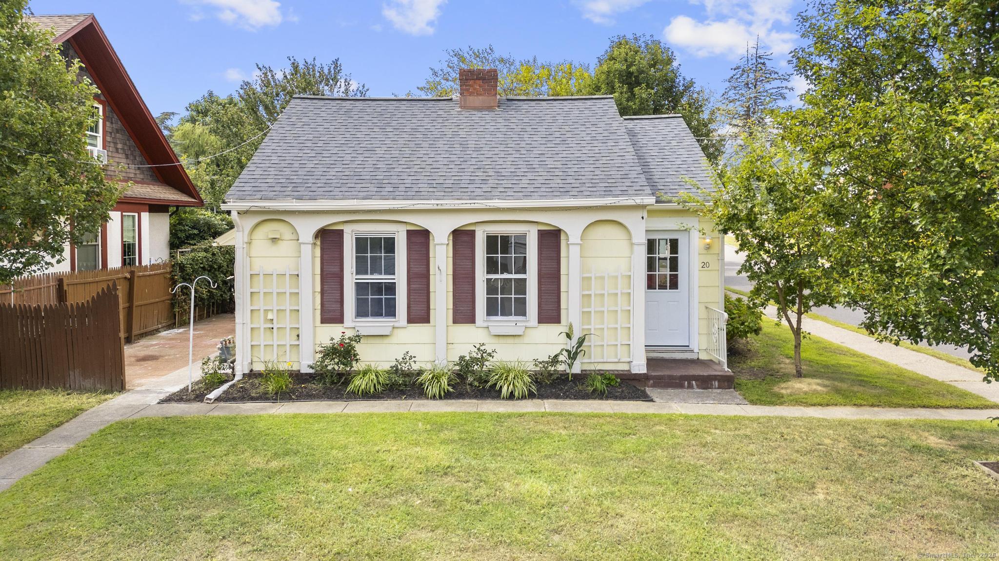 front view of house with a yard