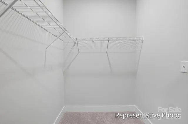 a view of small space with racks on the wall