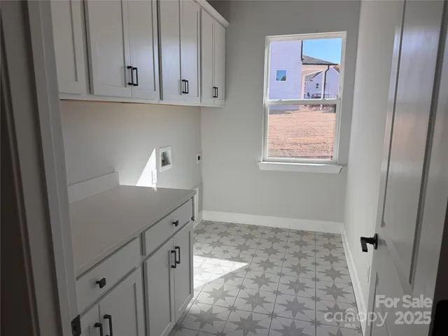 a view of cabinets and window