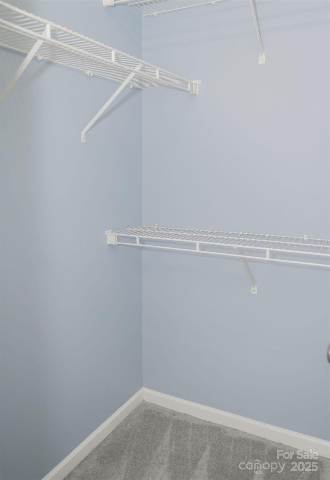105 South Tanninger Road Mount Holly, NC 28120 - Photo 12 of 46 a view of a room with racks on the wall