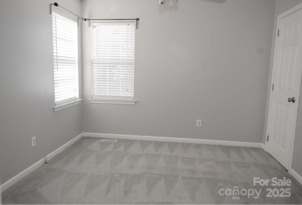 105 South Tanninger Road Mount Holly, NC 28120 - Photo 24 of 46 an empty room with a window