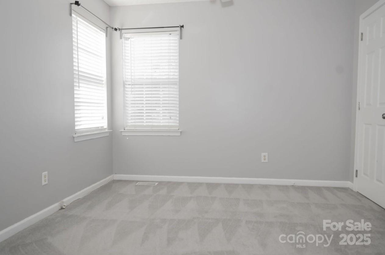 105 South Tanninger Road Mount Holly, NC 28120 - Photo 25 of 46 an empty room with a window