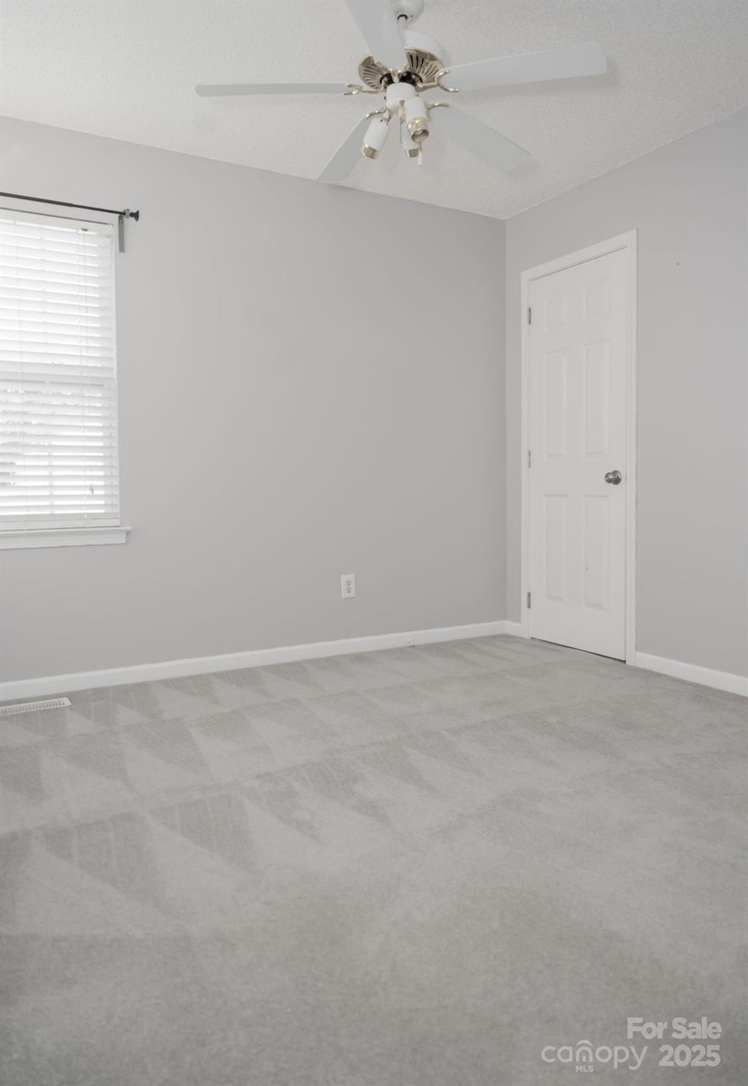 105 South Tanninger Road Mount Holly, NC 28120 - Photo 26 of 46 a view of an empty room with a window