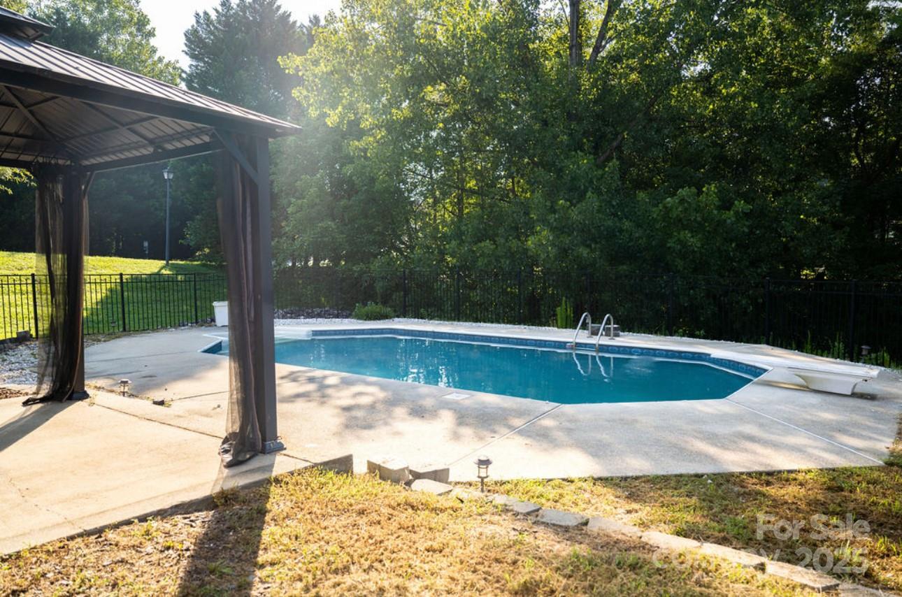 105 South Tanninger Road Mount Holly, NC 28120 - Photo 44 of 46 a view of a swimming pool with an outdoor space