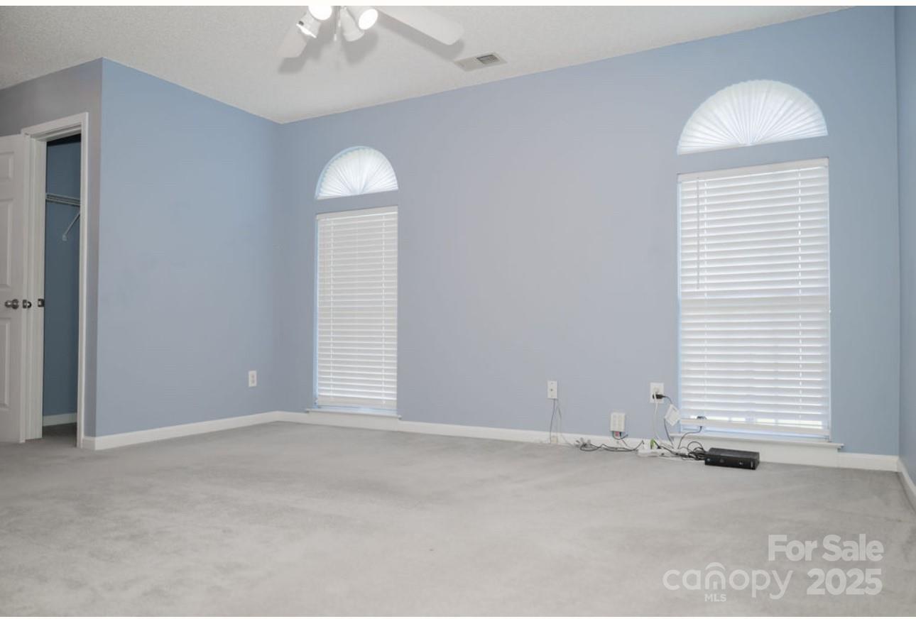 105 South Tanninger Road Mount Holly, NC 28120 - Photo 10 of 46 an empty room with a window
