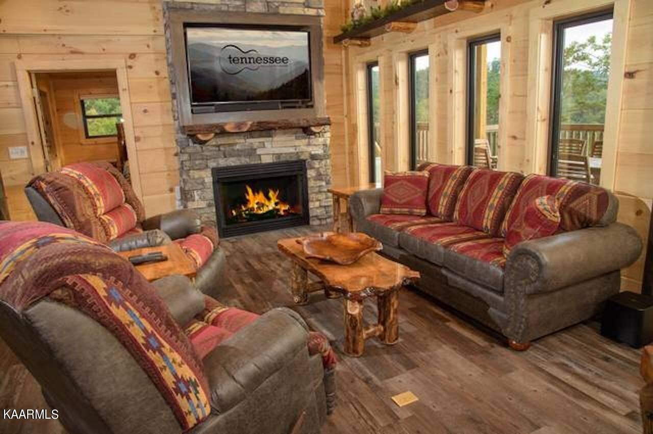 2252 Coopers Hawk Way Sevierville, TN 37862 - Photo 13 of 56 a living room with furniture fireplace and flat screen tv