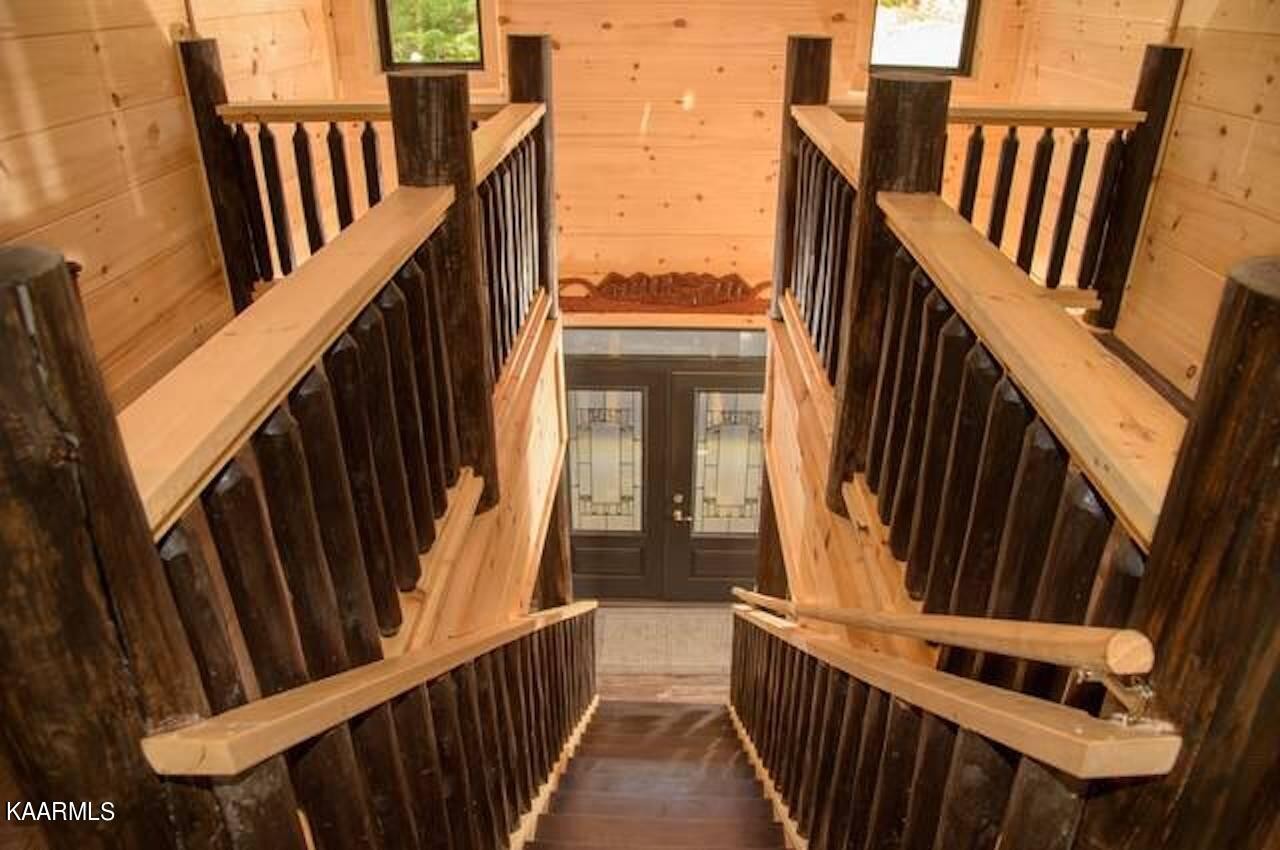 2252 Coopers Hawk Way Sevierville, TN 37862 - Photo 31 of 56 a view of balcony with wooden fence and stairs