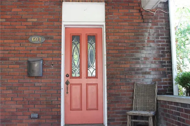 a brick building with a door