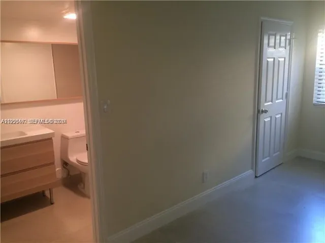 a bathroom with a toilet