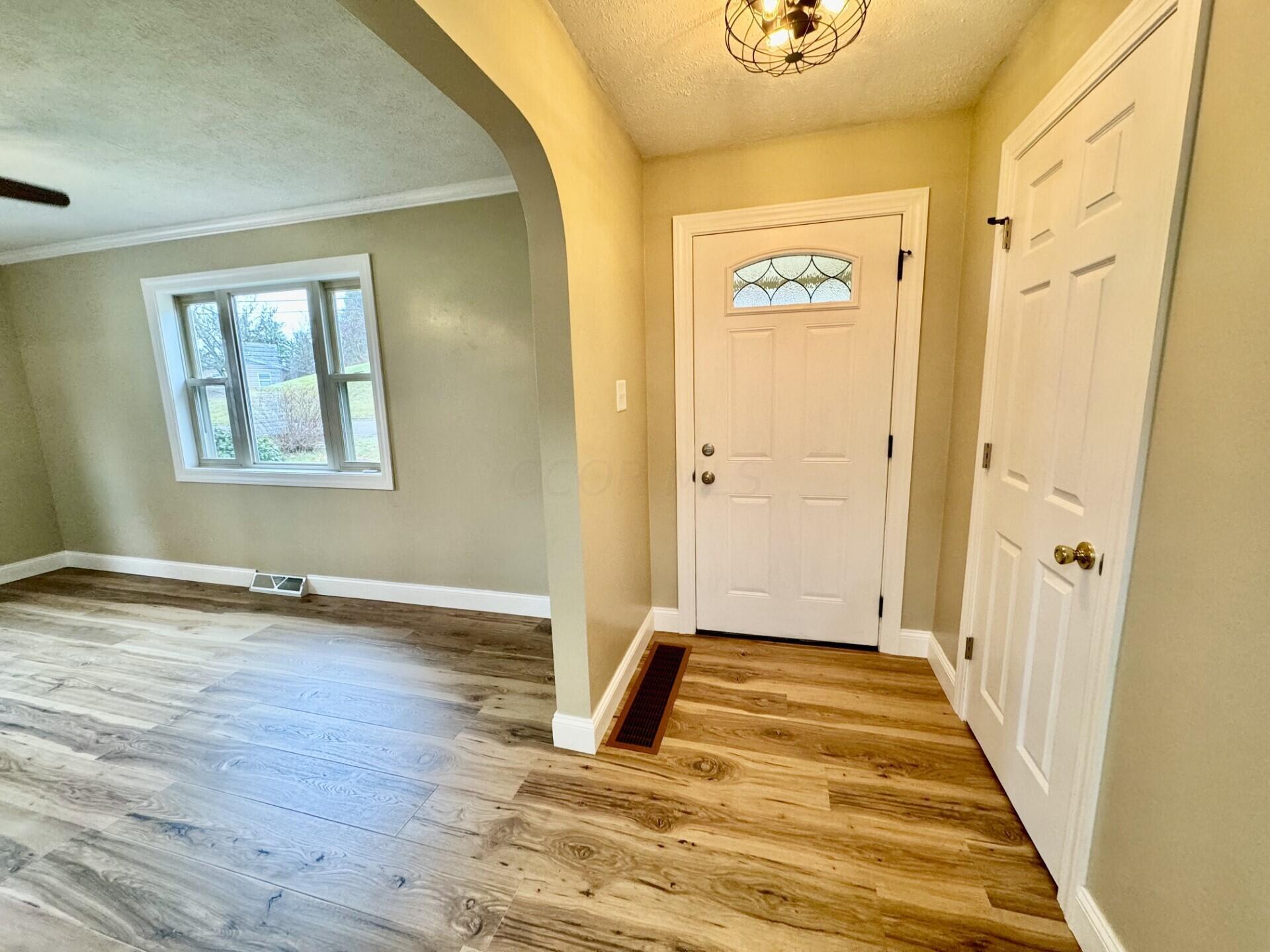 308 NW Road Logan, OH 43138 - Photo 11 of 51 Front foyer area and front door