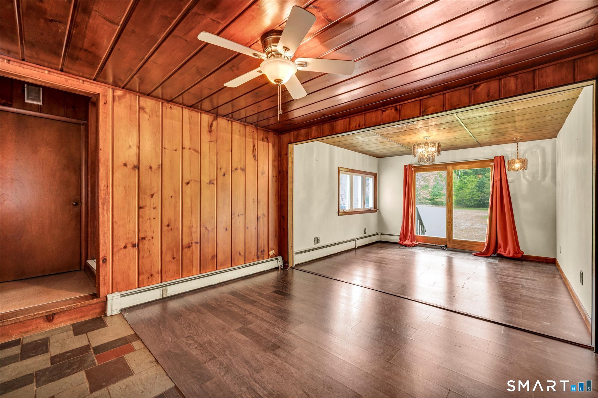 740 Rainbow Road Windsor, CT 06095 - Photo 9 of 40 a view of empty room with wooden floor and fan