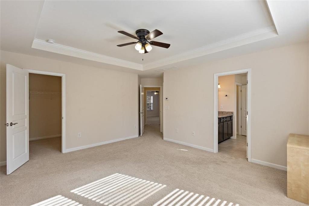 3500 Graham Way Southwest Lilburn, GA 30047 - Photo 34 of 47 a view of a livingroom with a ceiling fan and entryway