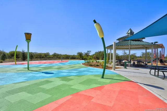 a view of a backyard with a slide