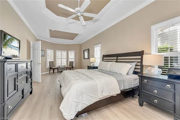 a bedroom with bed and window