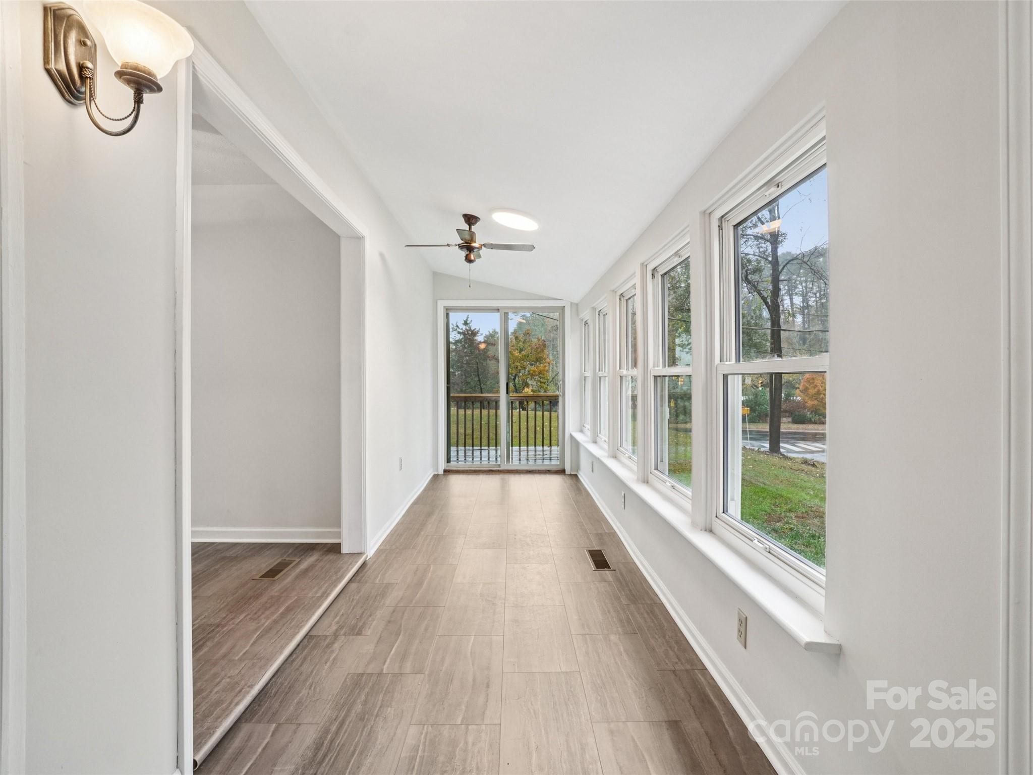 34 Parkview Drive Brevard, NC 28712 - Photo 2 of 38 a view of an entryway with wooden floor