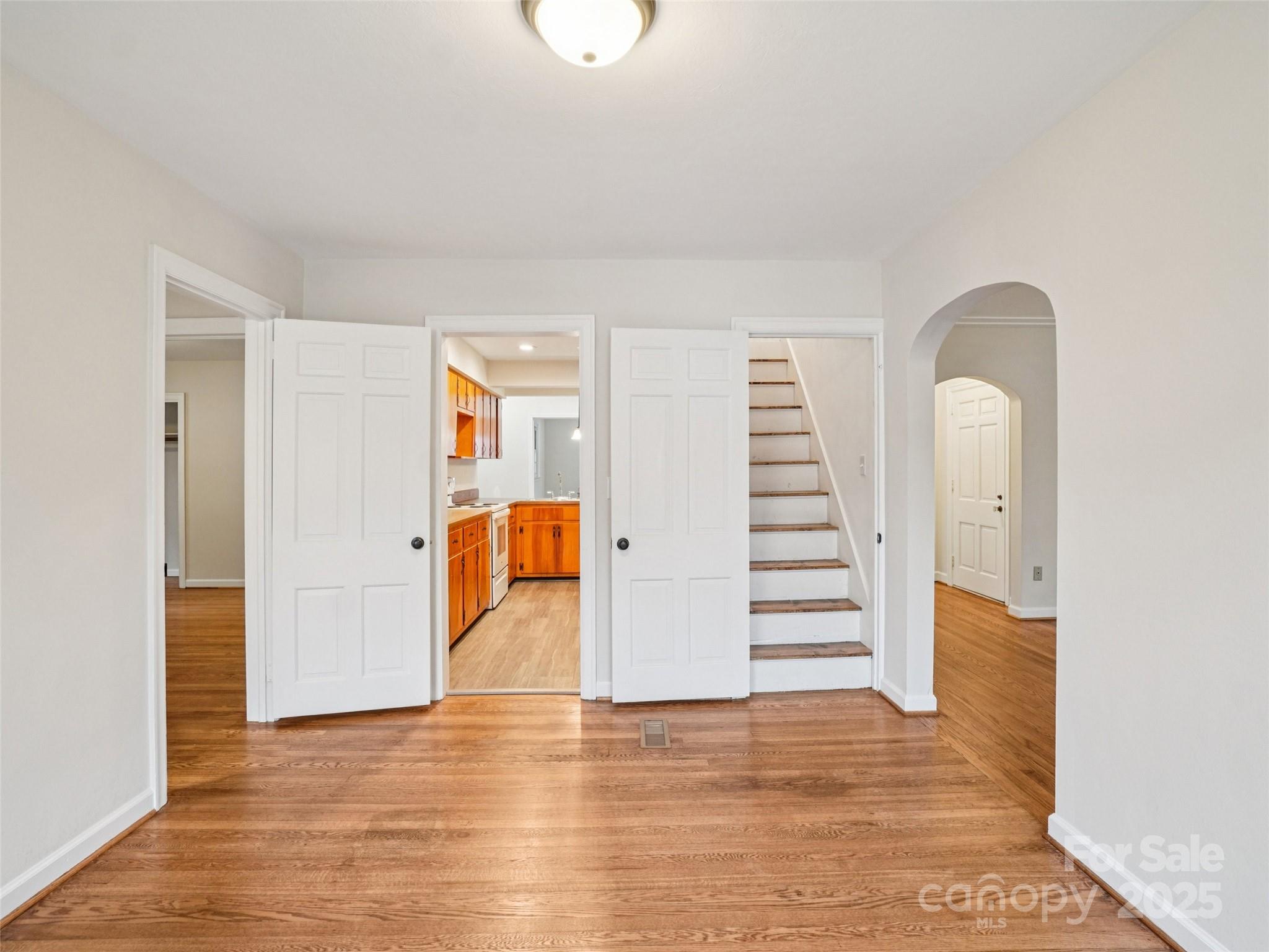 34 Parkview Drive Brevard, NC 28712 - Photo 22 of 38 a view of a room with stairs and a wooden floor