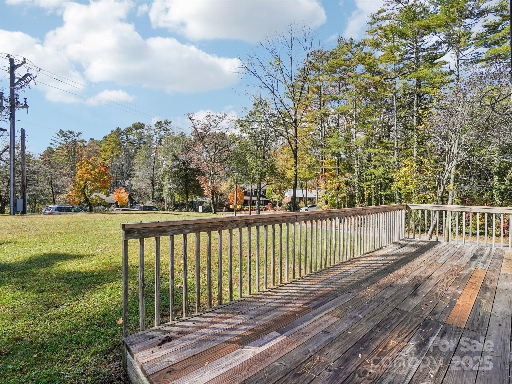 34 Parkview Drive Brevard, NC 28712 - Photo 33 of 38 a view of a balcony with wooden floor