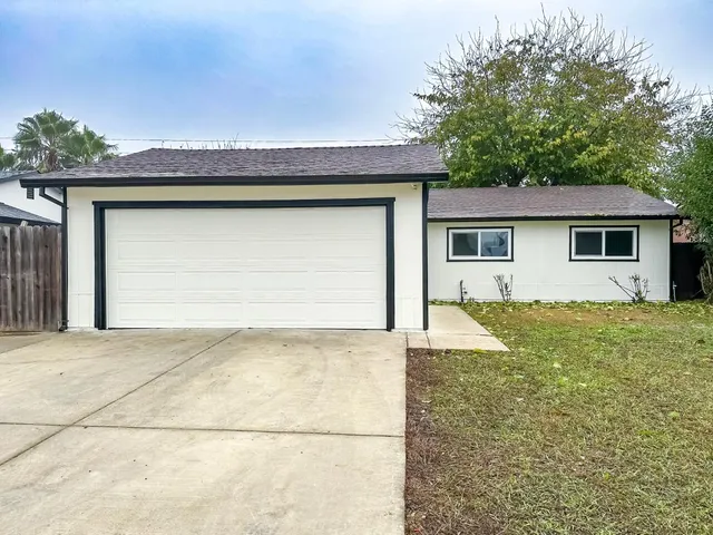 a view of outdoor space yard and garage