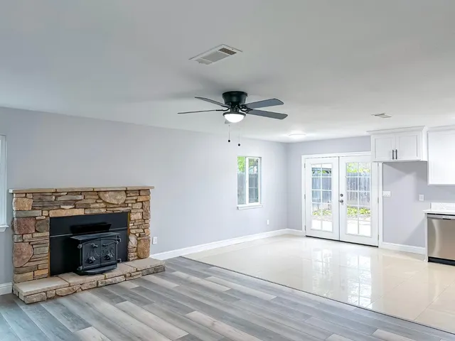 an aerial view of a house with outdoor space