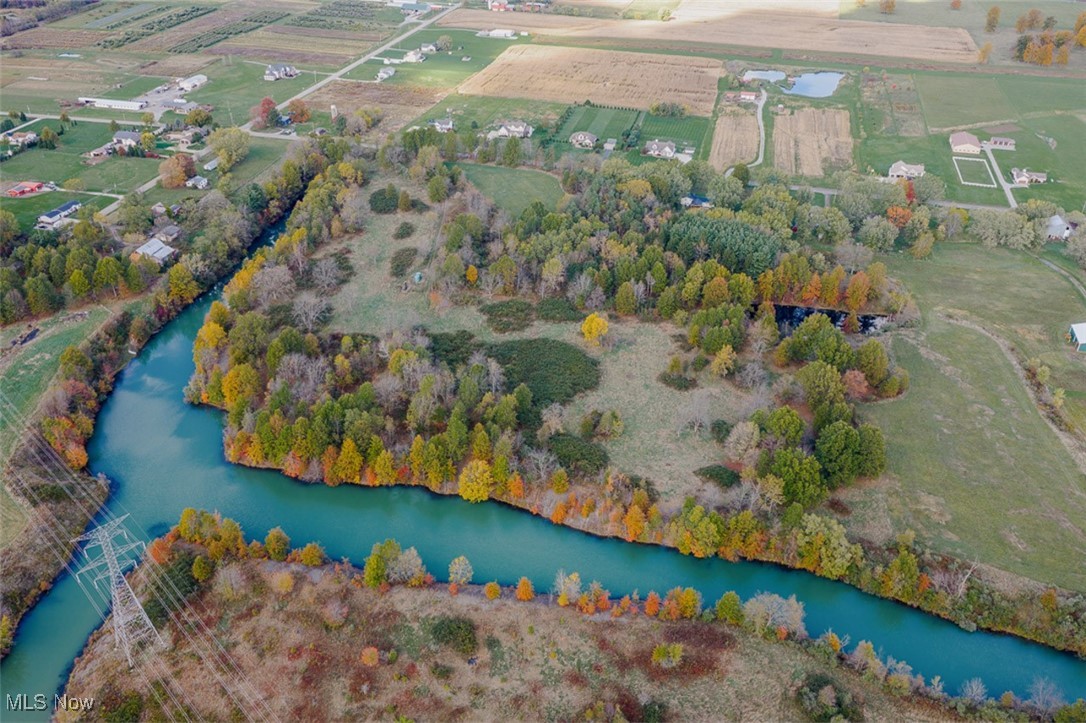 11511 North Johnson Road Beloit, OH 44609 - Photo 13 of 17 Aerial view of property and surrounding area featuring rural landscape