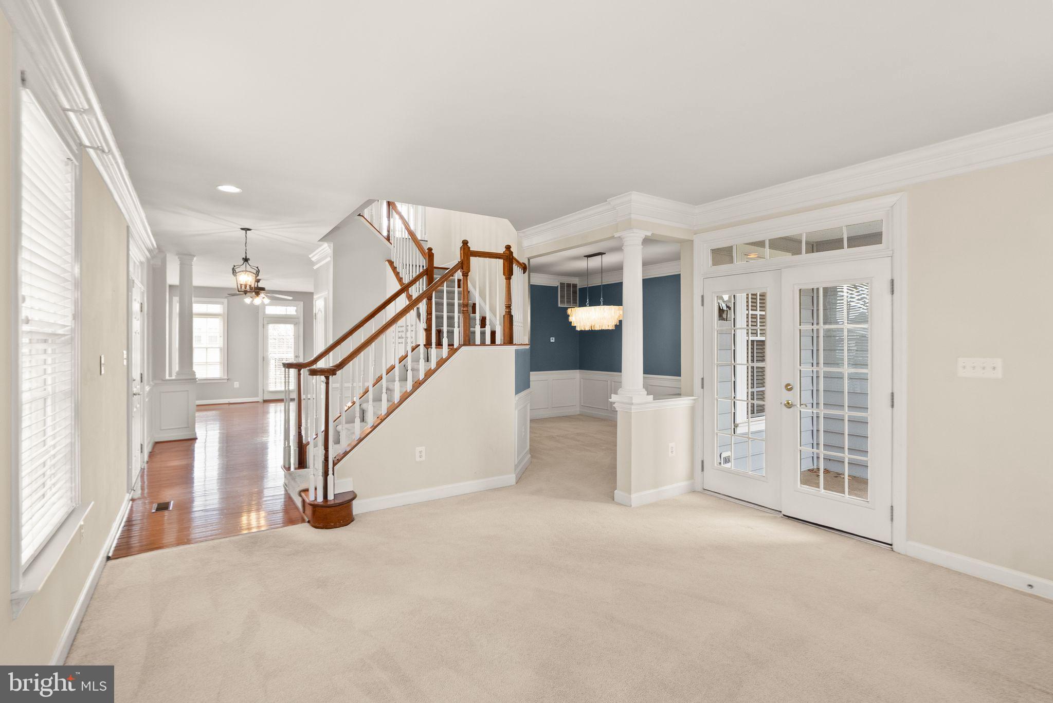 11821 Whitworth Cannon Lane Bristow, VA 20136 - Photo 15 of 70 a view of an entryway with staircase