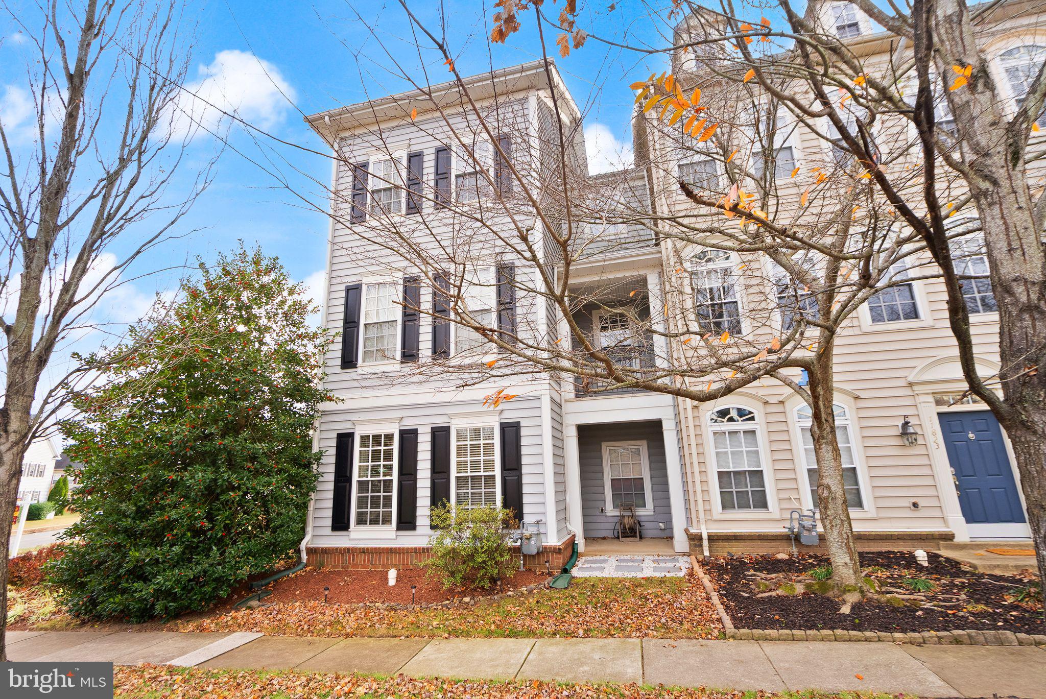 11821 Whitworth Cannon Lane Bristow, VA 20136 - Photo 3 of 70 front view of a building
