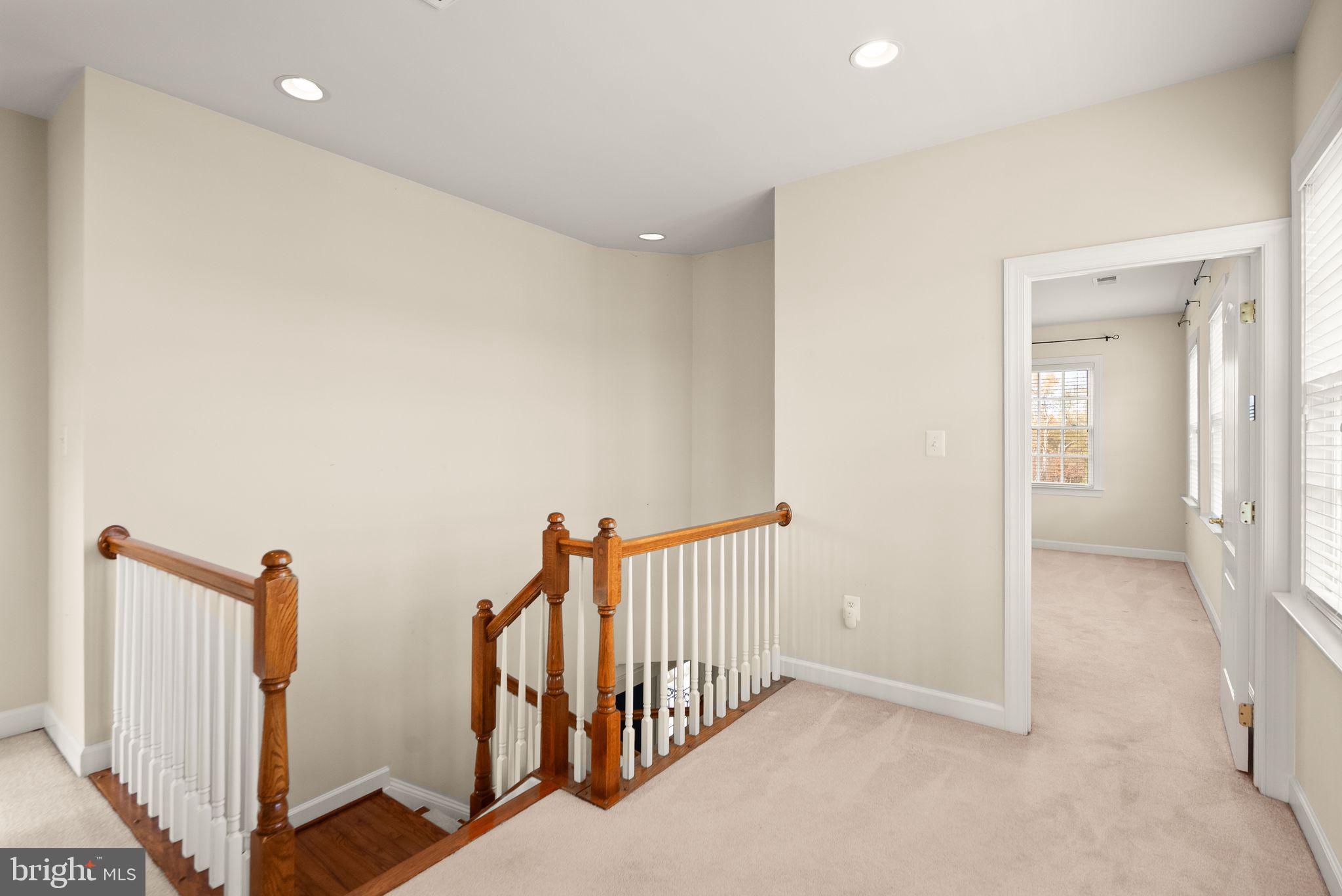 11821 Whitworth Cannon Lane Bristow, VA 20136 - Photo 35 of 70 a view of a hallway with a hallway