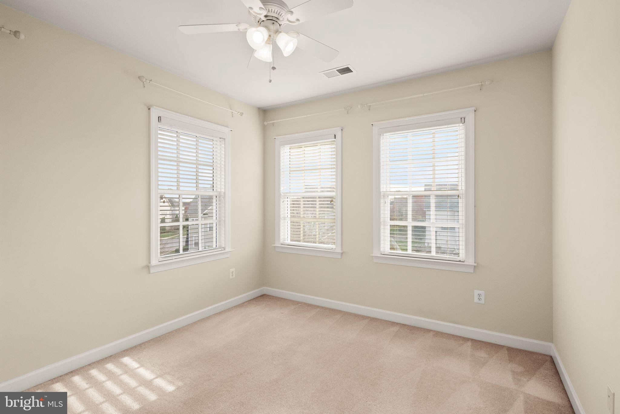 11821 Whitworth Cannon Lane Bristow, VA 20136 - Photo 49 of 70 an empty room with a window