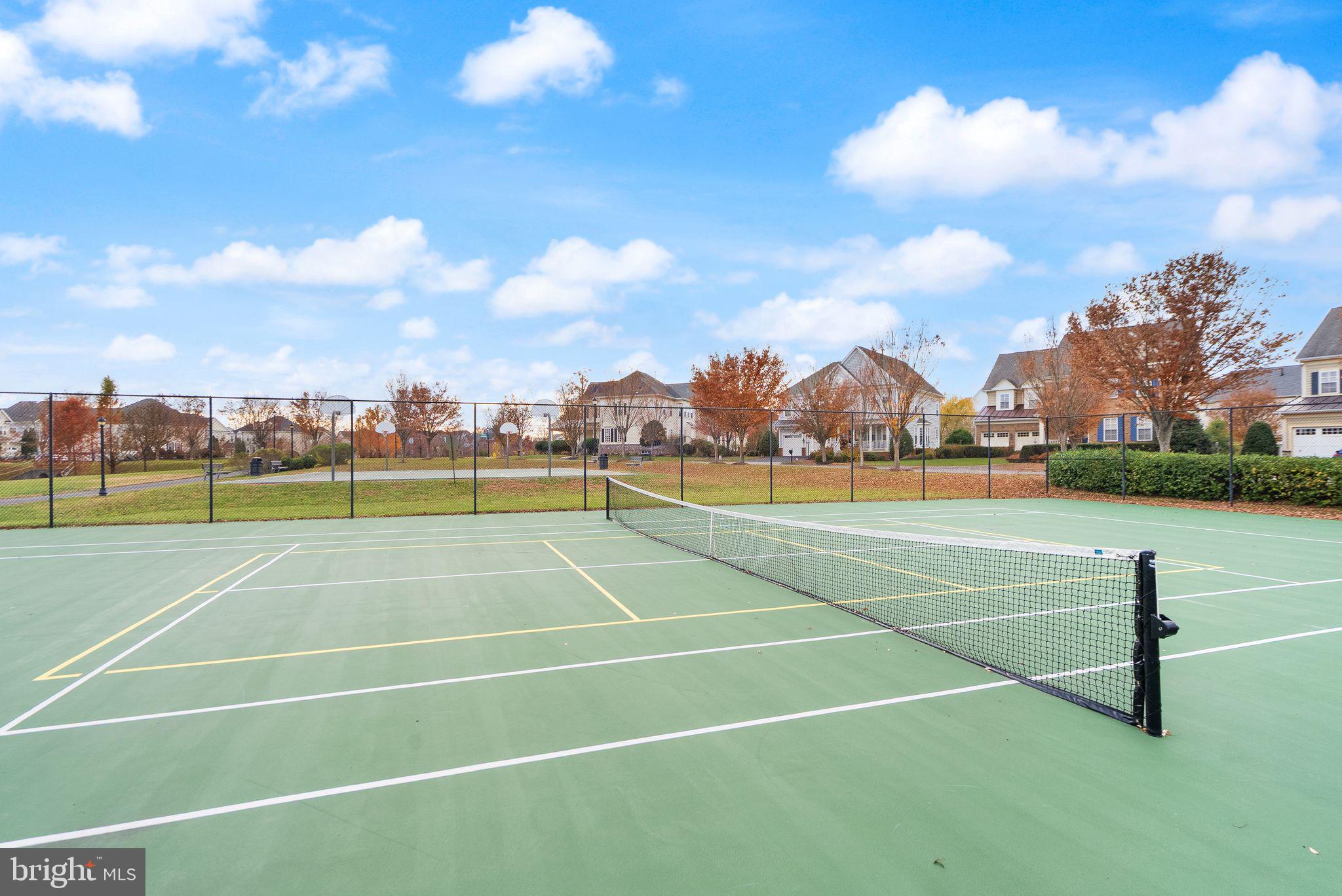11821 Whitworth Cannon Lane Bristow, VA 20136 - Photo 69 of 70 a view of an outdoor space and tennis court
