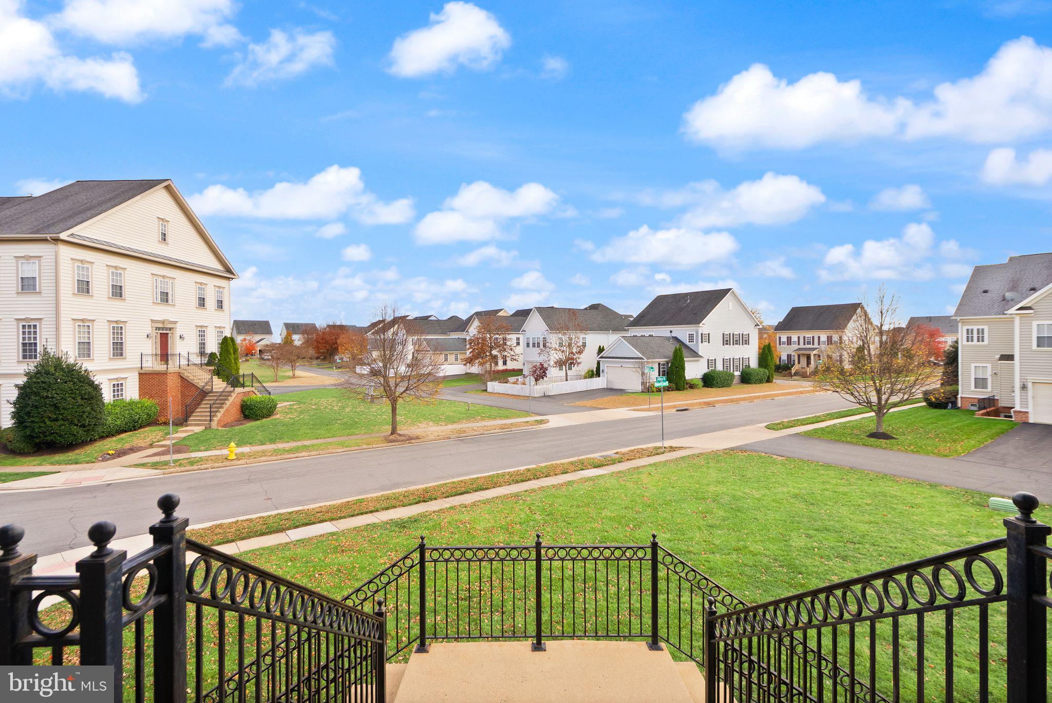 11821 Whitworth Cannon Lane Bristow, VA 20136 - Photo 7 of 70 a view of a swimming pool and a terrace