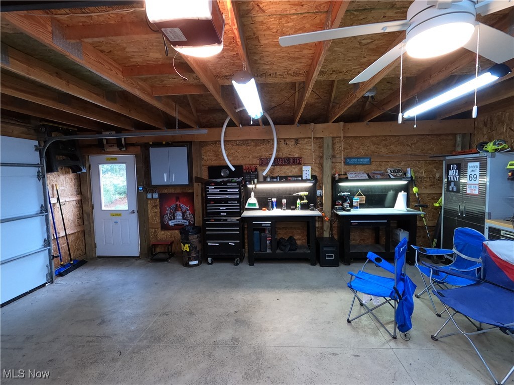 2421 McCoy Road Wooster, OH 44691 - Photo 36 of 39 Garage featuring a workshop area