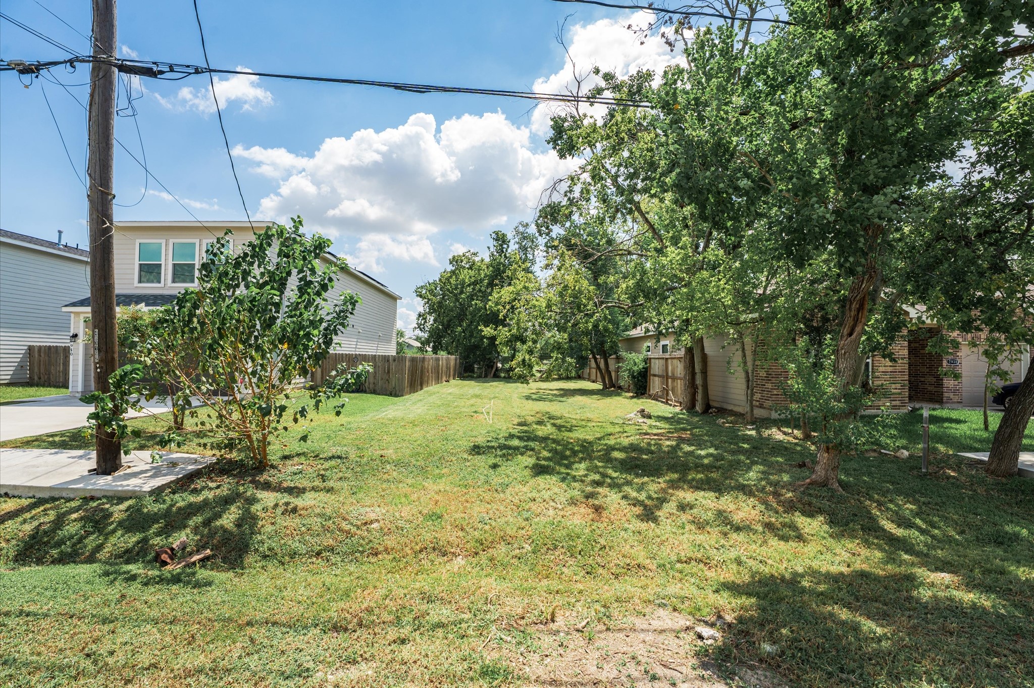 0 Blue Street Houston, TX 77028 - Photo 2 of 6 a view of a yard in front of a house