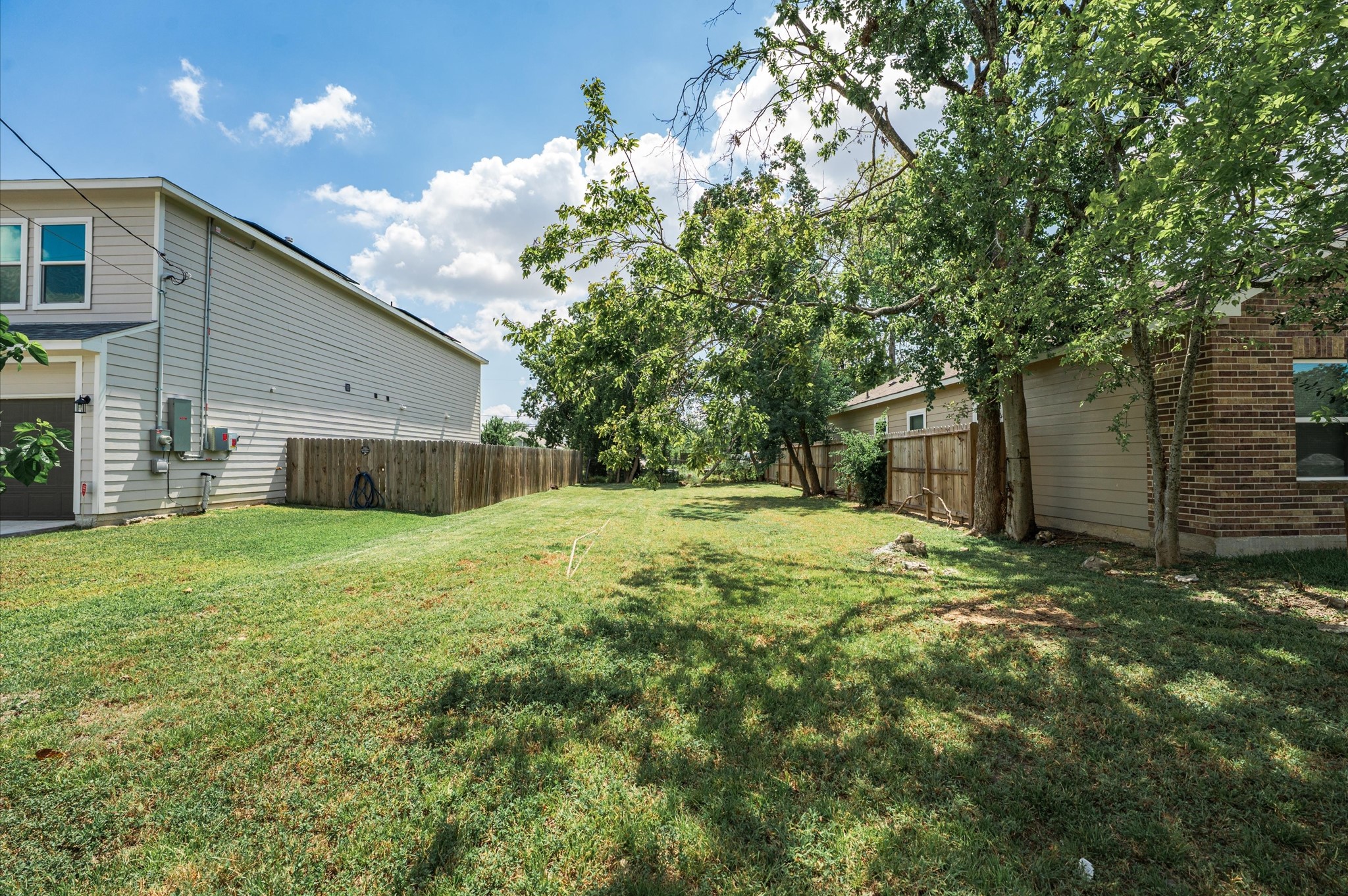 0 Blue Street Houston, TX 77028 - Photo 5 of 6 a yellow house in middle of the forest