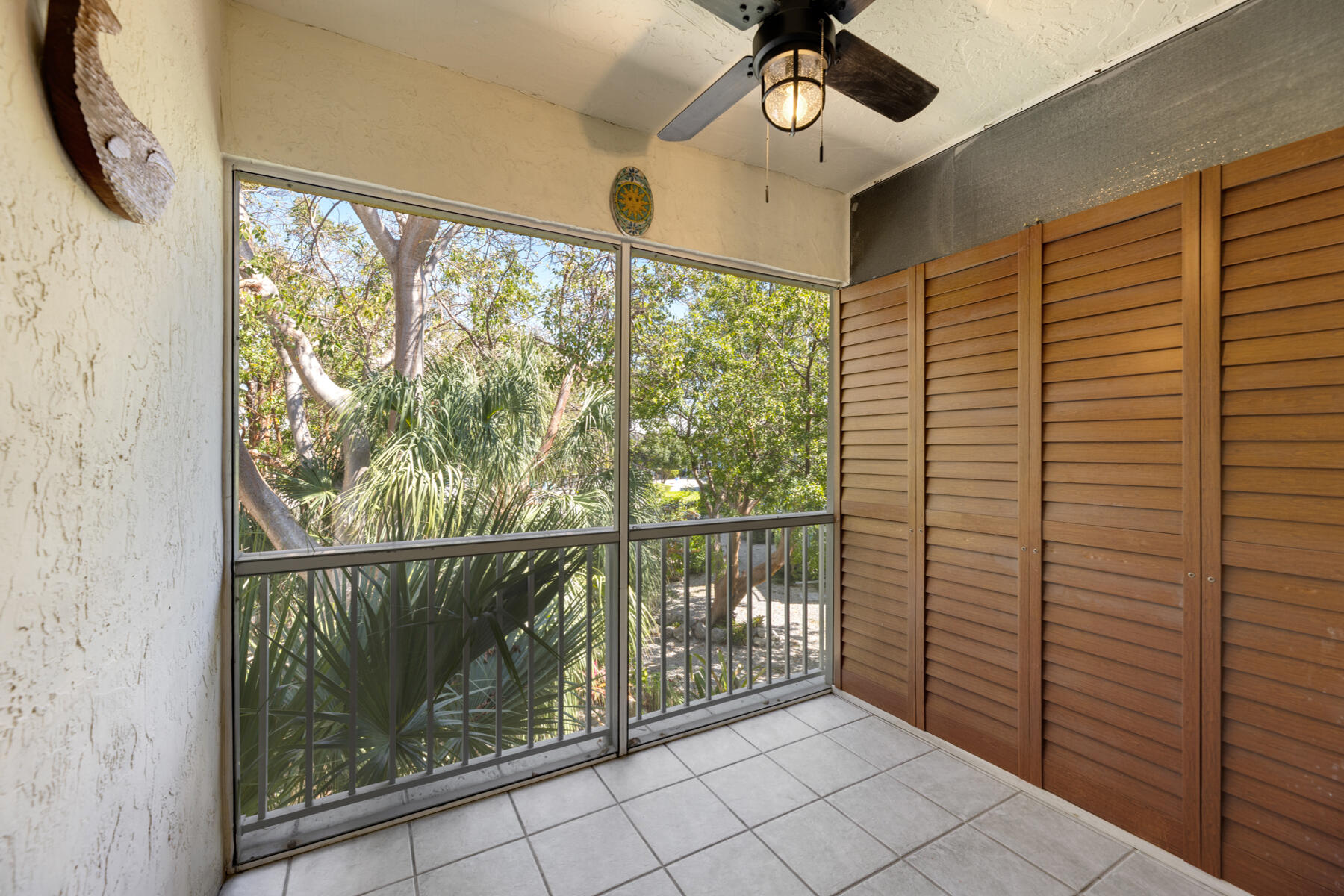 98202 Windward Avenue Key Largo, FL 33037 - Photo 17 of 32 Private screened in porch
