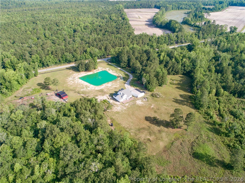 1865 John B Carter Road Fayetteville, NC 28312 - Photo 47 of 49 an aerial view of residential house with outdoor space