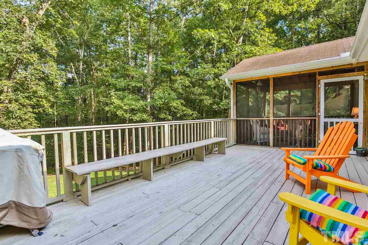 2213 Hortons Pond Road Apex, NC 27523 - Photo 20 of 25 Large deck at rear runs entire length of home - great entertaining space!