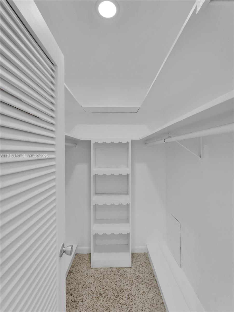280 Northeast Spanish Court, Unit 280 Boca Raton, FL 33432 - Photo 21 of 41 a view of walk in closet