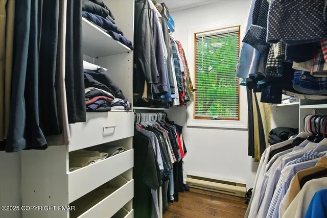 a view of house with deck and outdoor seating