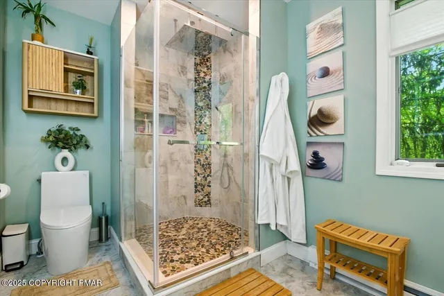 a view of balcony with deck and outdoor seating