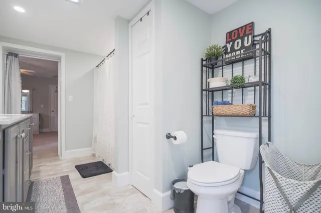 a bathroom with a sink double vanity and a mirror
